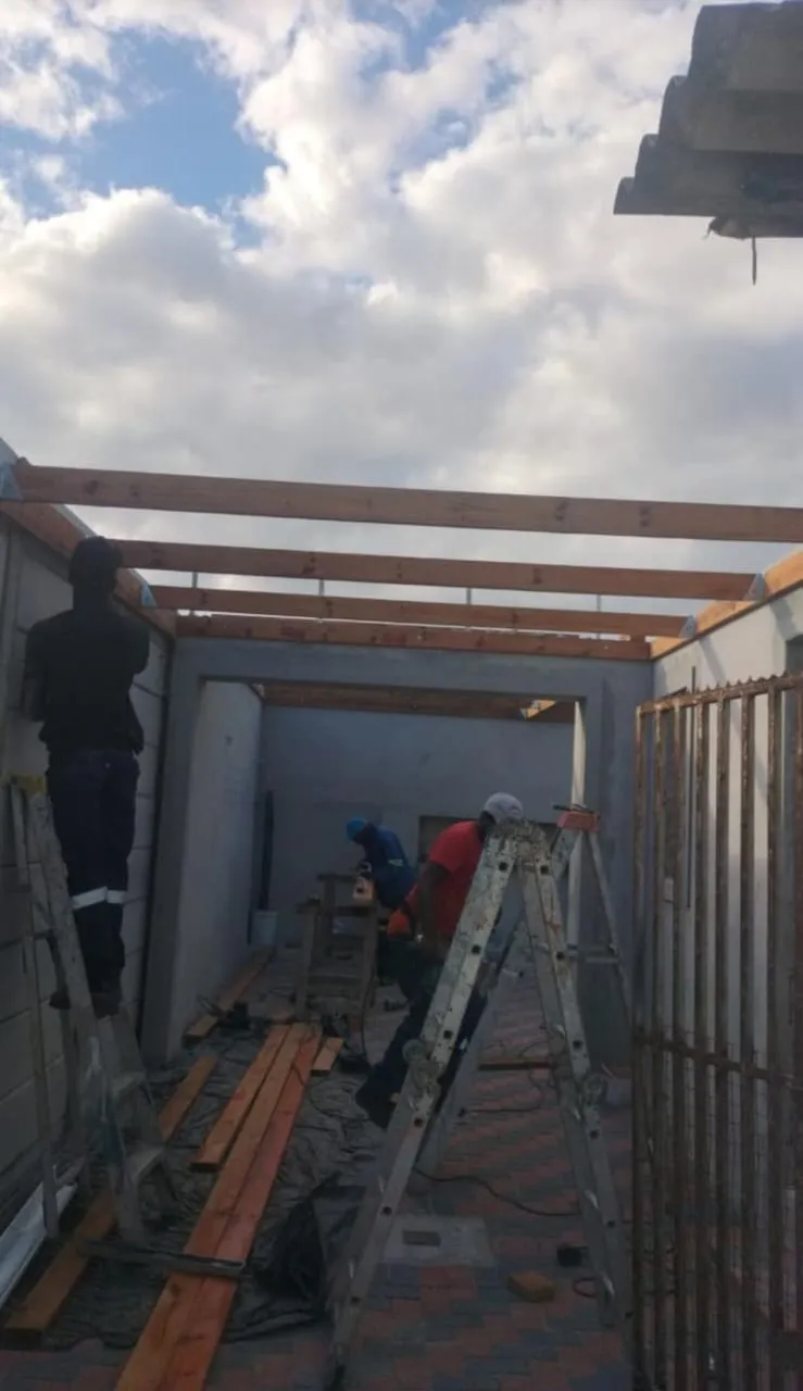 Timber roof structure being built