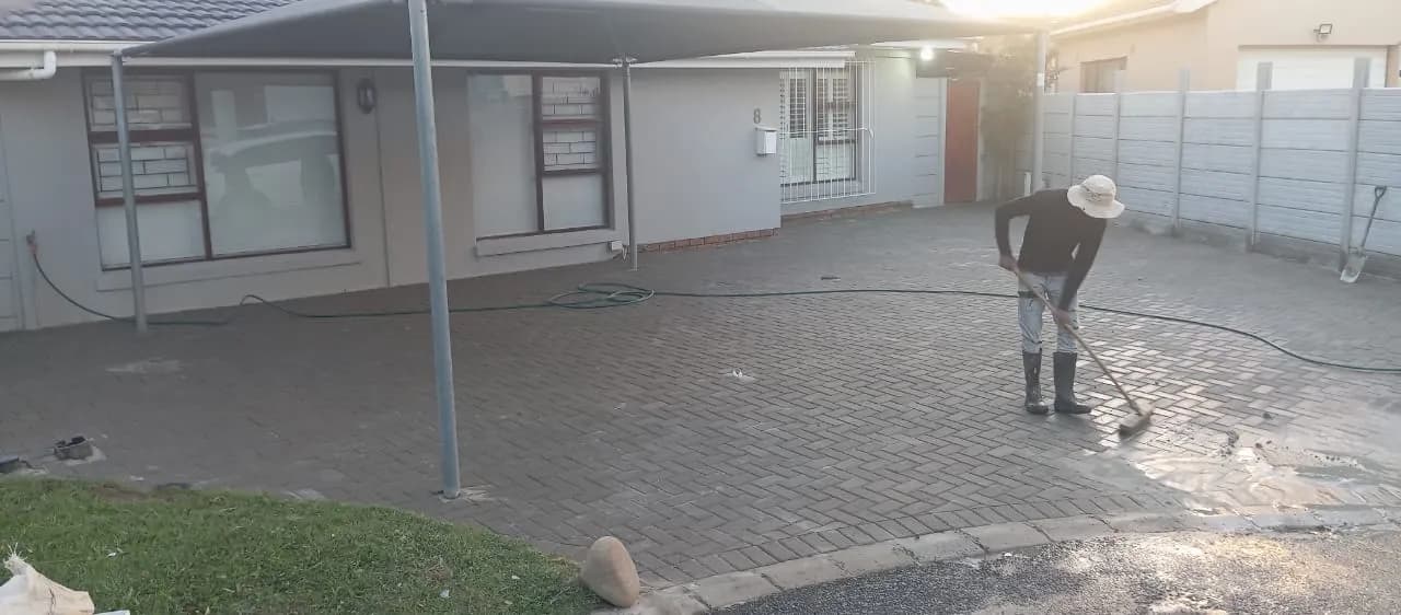 Brick-paved driveway being finished