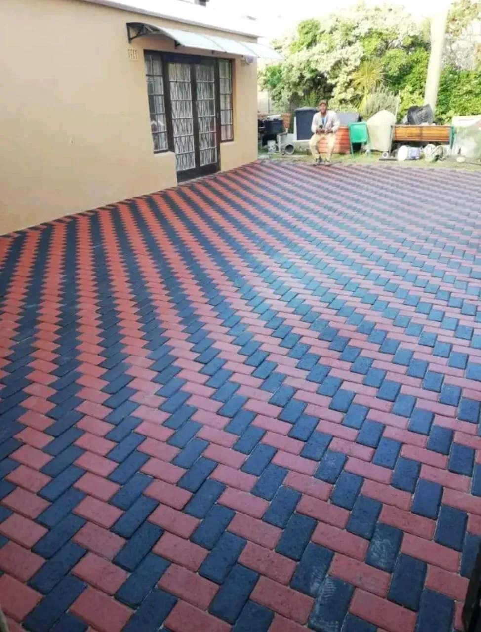 Red and charcoal herringbone driveway